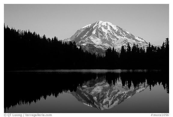 Mt Rainier with perfect reflection in Eunice Lake at sunset. Mount Rainier National Park, Washington, USA.