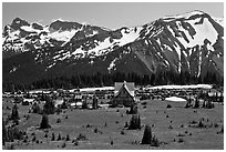 Meadows, buildings and parking lot, mountains, Sunrise. Mount Rainier National Park, Washington, USA. (black and white)