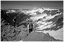 Mountaineers on ridge below  summit of Sahale Peak, North Cascades National Park. Washington, USA. (black and white)