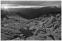 Last rays of sunset color rocks in alpine basin, North Cascades National Park. Washington, USA. (black and white)