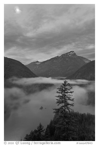 Diablo Lake, fog, and moon, dawn, North Cascades National Park Service Complex.  (black and white)