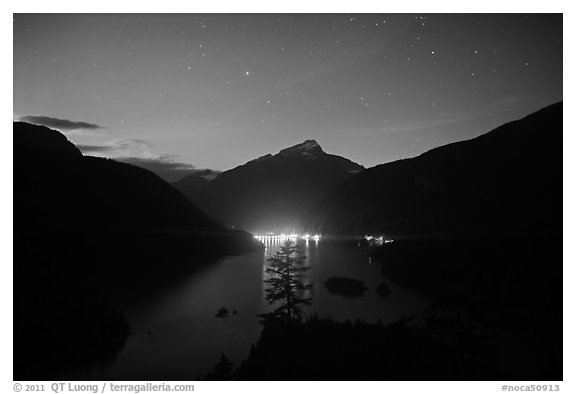 Diablo Lake by night with lights of dam,  North Cascades National Park Service Complex. Washington, USA.