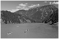 Canoes and kayaks on Diablo Lake,  North Cascades National Park Service Complex. Washington, USA. (black and white)