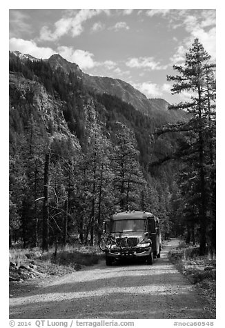 National Park shuttle bus on Stehekin Valley road, North Cascades National Park Service Complex.  (black and white)