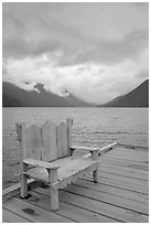 Chair on pier, Crescent Lake. Olympic National Park, Washington, USA. (black and white)