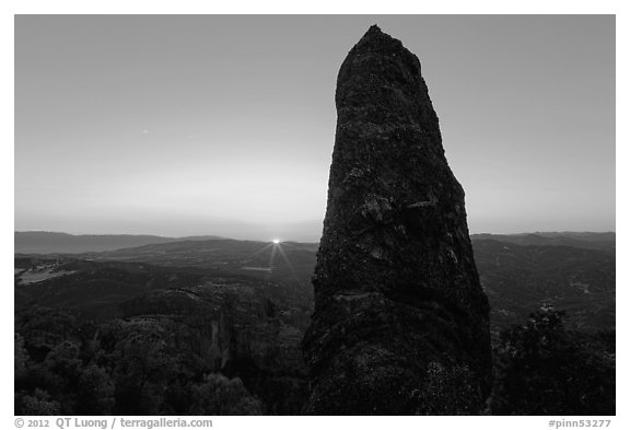 Rock pillar and setting sun. Pinnacles National Park, California, USA.