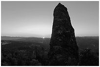 Rock pillar and setting sun. Pinnacles National Park, California, USA. (black and white)