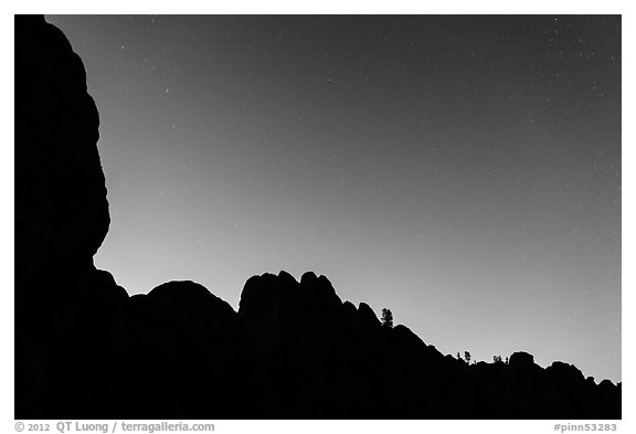 Rocky ridge and stars at twilight. Pinnacles National Park (black and white)