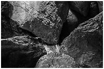 Jumble of rocks in talus cave. Pinnacles National Park, California, USA. (black and white)