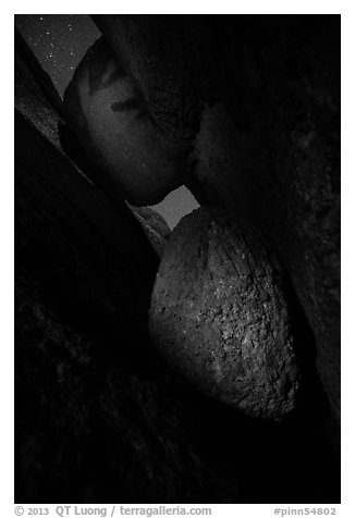 Talus cave with boulders at night. Pinnacles National Park (black and white)