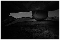 Stary sky seen between walls, Balconies Cave. Pinnacles National Park, California, USA. (black and white)