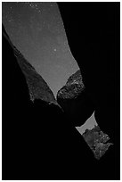 Sky with stars above Balconies Cave. Pinnacles National Park, California, USA. (black and white)