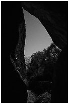 Looking out Balconies Cave at night. Pinnacles National Park, California, USA. (black and white)