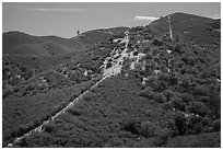 Pig fence climbing up to Chalone Peak. Pinnacles National Park, California, USA. (black and white)