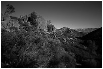 Moonlit landscape with rock towers. Pinnacles National Park, California, USA. (black and white)