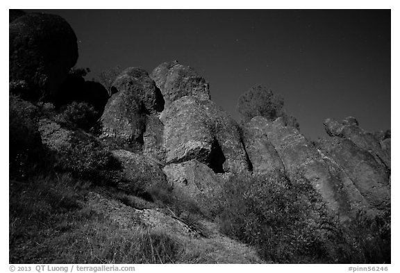 Looking up rock towers and starry night sky. Pinnacles National Park (black and white)