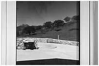 Hills and Pinnacles, West Pinnacles Visitor Contact Station window reflexion. Pinnacles National Park ( black and white)