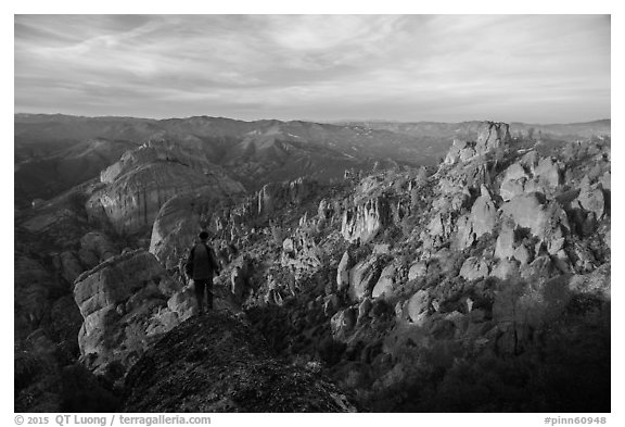 Visitor looking, Balconies and Square Block at sunset. Pinnacles National Park (black and white)