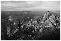 Visitor looking, Balconies and Square Block at sunset. Pinnacles National Park ( black and white)