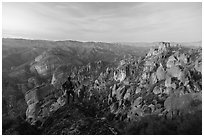 Visitor looking, Balconies and Square Block at dusk. Pinnacles National Park ( black and white)