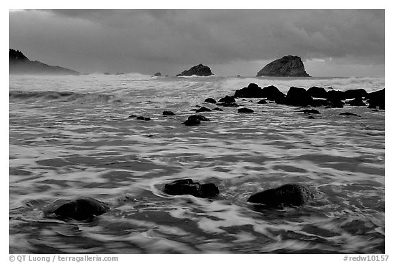 Turbulent waters, stormy dusk, False Klamath Cove. Redwood National Park, California, USA.