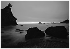 Rocks and seastacks, cloudy sunset. Redwood National Park, California, USA. (black and white)