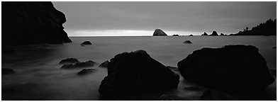 Boulders and seastacks and dusk. Redwood National Park (Panoramic black and white)