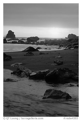 Stream on beach at sunset, False Klamath cove. Redwood National Park (black and white)