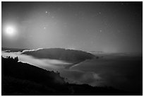 Mouth of Klamath River and moon at night. Redwood National Park ( black and white)