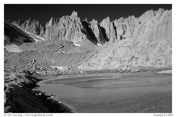 Frozen lake near Trail Camp and Mt Whitney chain. Sequoia National Park, California, USA.