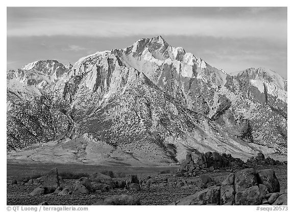 Volcanic boulders in Alabama hills and Lone Pine Peak, sunrise. Sequoia National Park (black and white)