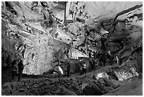 Tourists in huge Subterranean room, Crystal Cave. Sequoia National Park, California, USA. (black and white)