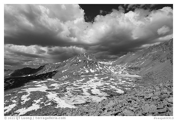High Sierra landscape with frozen tarns and afternoon clouds. Sequoia National Park (black and white)