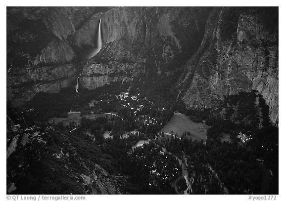 Yosemite Falls, Valley and Village seen from Glacier Point, dusk. Yosemite National Park, California, USA.