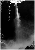 Bridalveil Falls as sun reaches upper shaft of water. Yosemite National Park, California, USA. (black and white)