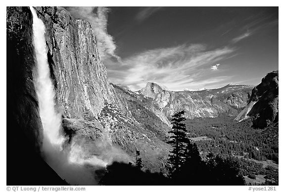 Upper Yosemite Falls with rainbow at base, early afternoon. Yosemite National Park, California, USA.