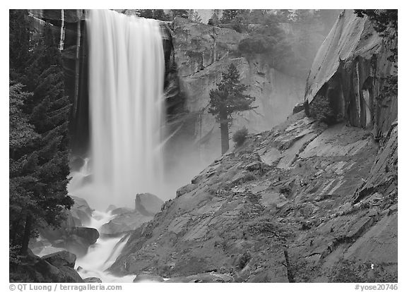 Vernal Fall and wet granite slab. Yosemite National Park, California, USA.