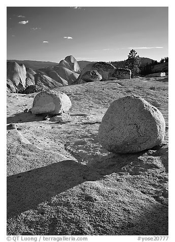 Glacial erratic boulders and Half Dome, Olmsted Point, afternoon. Yosemite National Park (black and white)