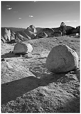 Glacial erratic boulders and Half Dome, Olmsted Point, afternoon. Yosemite National Park ( black and white)