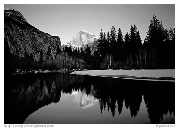 Half-Dome reflected in Merced River near Sentinel Bridge, sunset. Yosemite National Park, California, USA.