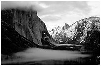 Yosemite Valley from Tunnel View with fog in winter. Yosemite National Park, California, USA. (black and white)