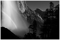 Upper Yosemite Falls with double moonbow and Half-Dome. Yosemite National Park, California, USA. (black and white)