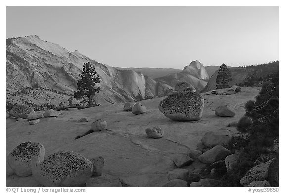Glacial erratic boulders, Clouds Rest, and Half-Dome from Olmstedt Point, dusk. Yosemite National Park (black and white)