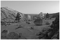 Glacial erratic boulders, Clouds Rest, and Half-Dome from Olmstedt Point, dusk. Yosemite National Park, California, USA. (black and white)
