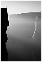 Hiker surveying Yosemite Valley from Profile Cliff overlook. Yosemite National Park ( black and white)