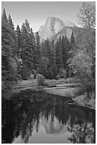 Half Dome reflected in Merced River at sunset. Yosemite National Park, California, USA. (black and white)