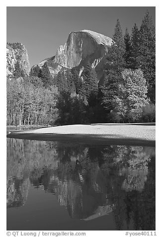Half Dome reflected in Merced River in the fall. Yosemite National Park, California, USA.