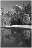 Half Dome reflected in Merced River in the fall. Yosemite National Park, California, USA. (black and white)