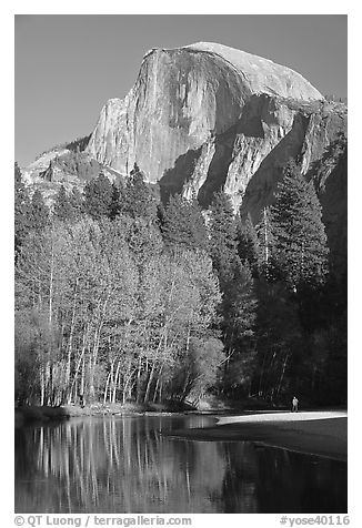 Banks of  Merced River with hiker below Half-Dome. Yosemite National Park (black and white)
