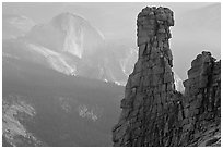 Rock tower and Half-Dome. Yosemite National Park, California, USA. (black and white)